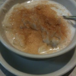 Laskaris Restaurant - Creamy & homemade, their rice pudding is served with or without a topper of milk. Cinn/sugar added @ table