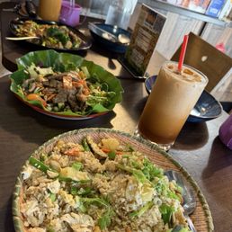 Pineapple fried rice, grilled beef salad, Pad See Eiw noodle, Thai tea. Pineapple fried rice, grilled beef salad, Pad See Eiw noodle, Thai tea.