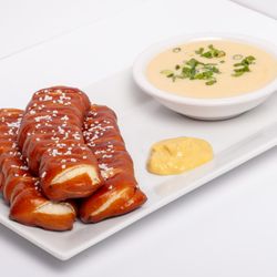 WhichCraft Taproom - Warm soft pretzels served with our house IPA Honey Dijon Mustard and warm house-made beer cheese sauce.