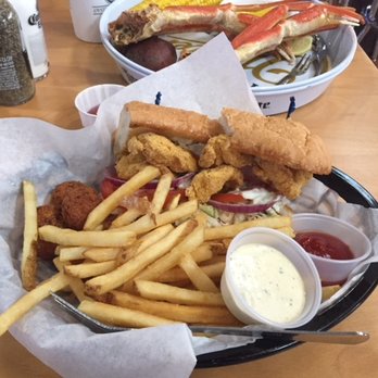Shuck Me - Shrimp Po'Boy, french fries, tender hush puppies. - Seafood Near Me - Broken Bow, Oklahoma Shuck Me - Shrimp Po'Boy, french fries, tender hush puppies. - Seafood Near Me - Broken Bow, Oklahoma