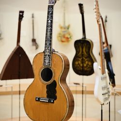 Musical Instrument Museum - Guitar and strings display on lower level