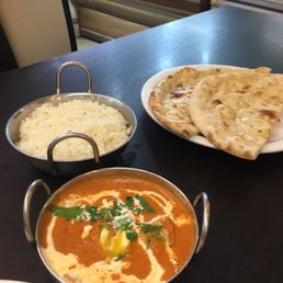 Butter chicken with white basmati rice and tandoor roti.. Absolutely delicious. Butter chicken with white basmati rice and tandoor roti.. Absolutely delicious.