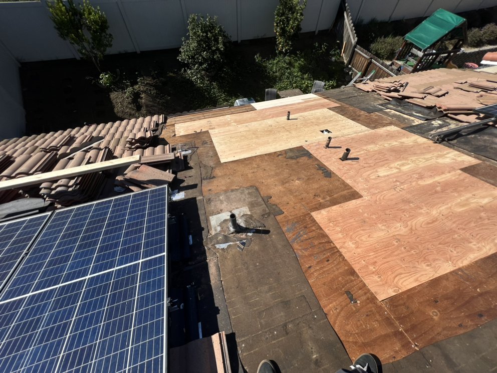 Slide of Courtesy Roofing Services