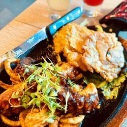 Pisco Express - Octopus and other wiggly sea things. Delicious! @ Pisco Express. Lake Nona, FL