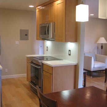 Rogers Electric - New kitchen electrical panel, overhead LED and fluorescent under cabinet lights - EV Charging Stations Near Me - Redwood City, California