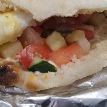 Bite - Middle Eastern Egg sandwich close up. - Sandwiches Near Me - New York, New York