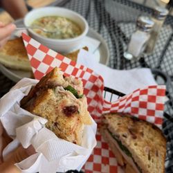 Artisan Eats Cafe & Fine Foods - Turkey Apple Brie on sourdough sandwich and the chicken soup and grilled cheese combo