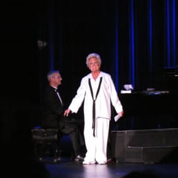 In her "Nellie Forbush" sailor suit she wore to open the show. In her "Nellie Forbush" sailor suit she wore to open the show.