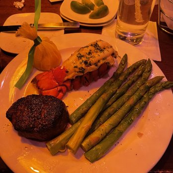 The Precinct - Steak and lobster with all asparagus (via redlight district lighting) - Steakhouses Near Me - Cincinnati, Ohio