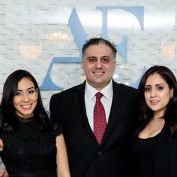 A E Skin - Dr. Alex and staff at the 2018 Holiday party.