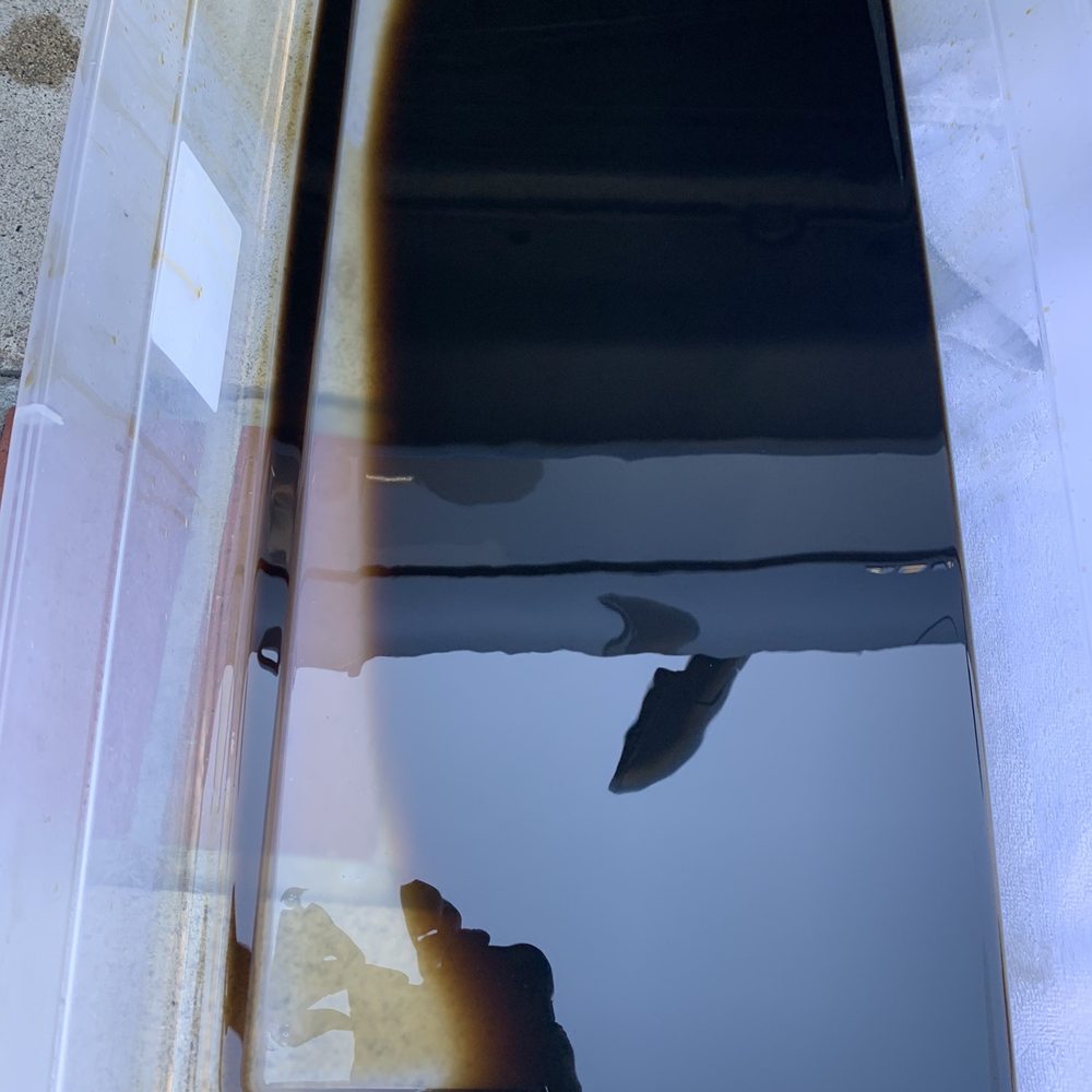 BMW Transmission fluid that has been burning due to a clogged water pump hose. BMW Transmission fluid that has been burning due to a clogged water pump hose.