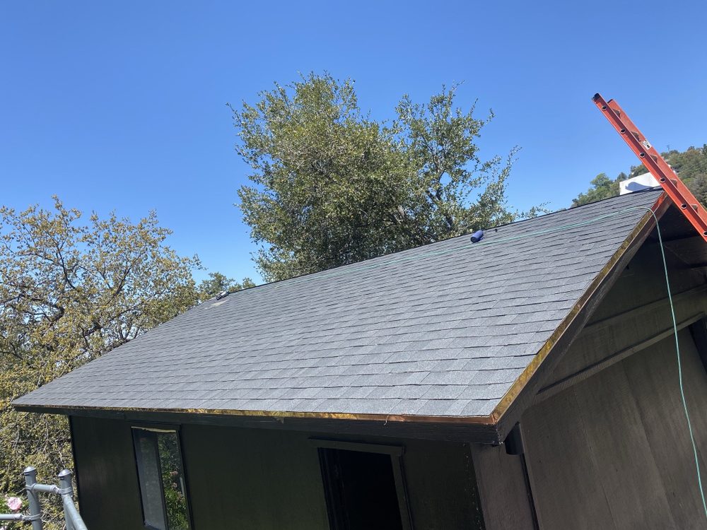 Slide of Libras Roofing Repair & Maintenance