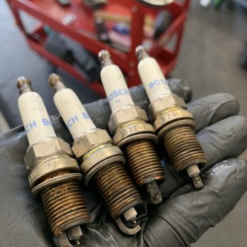 Bold Autoworks - Old BMW spark plugs with carbon deposits. - Auto Repair Near Me - Dublin, California Bold Autoworks - Old BMW spark plugs with carbon deposits. - Auto Repair Near Me - Dublin, California