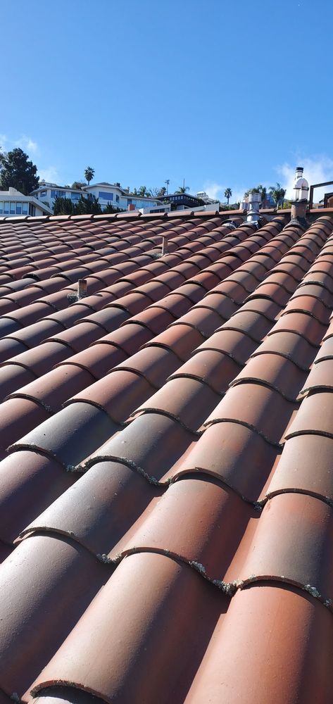 Slide of BD&E Roofing Services