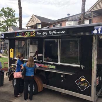 Tacolores - a group of people standing outside of a food truck - Food Trucks Near Me Tacolores - a group of people standing outside of a food truck - Food Trucks Near Me