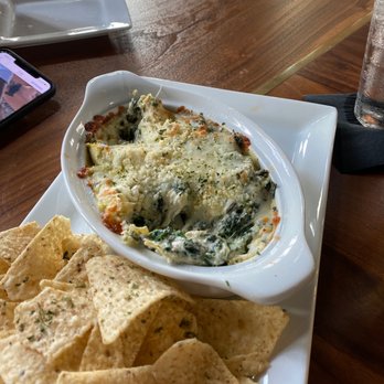 The Trap - The best spinach dip I've ever had!! Cheesy and the chips are incredible!! - Axe Throwing Near Me - Winter Park, Florida The Trap - The best spinach dip I've ever had!! Cheesy and the chips are incredible!! - Axe Throwing Near Me - Winter Park, Florida
