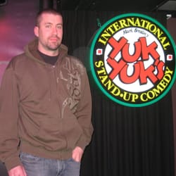Chris Griffin, winner of Calgary's 2011 "Great Canadian Laugh Off" on stage at the Calgary club.