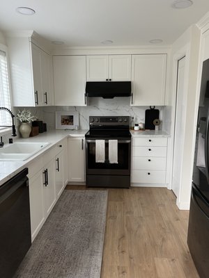 cabinet painting - This remodel was done on an old kitchen. The rest of the house was updated, so the kitchen stuck out like a sore thumb.