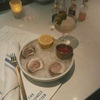 The Lonely Oyster - Bar menu oyster trio. Try with the Thai chili oil - Cocktail Bars Near Me - Los Angeles, California The Lonely Oyster - Bar menu oyster trio. Try with the Thai chili oil - Cocktail Bars Near Me - Los Angeles, California