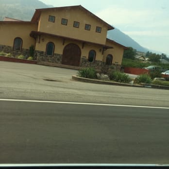 Cassini Cellars - a yellow building with a brown roof - Wineries Near Me - Oliver, British Columbia Cassini Cellars - a yellow building with a brown roof - Wineries Near Me - Oliver, British Columbia