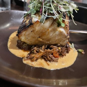 ORO Restaurant & Lounge - Sea bass on top of short rib - Tapas/Small Plates Near Me - Raleigh, North Carolina