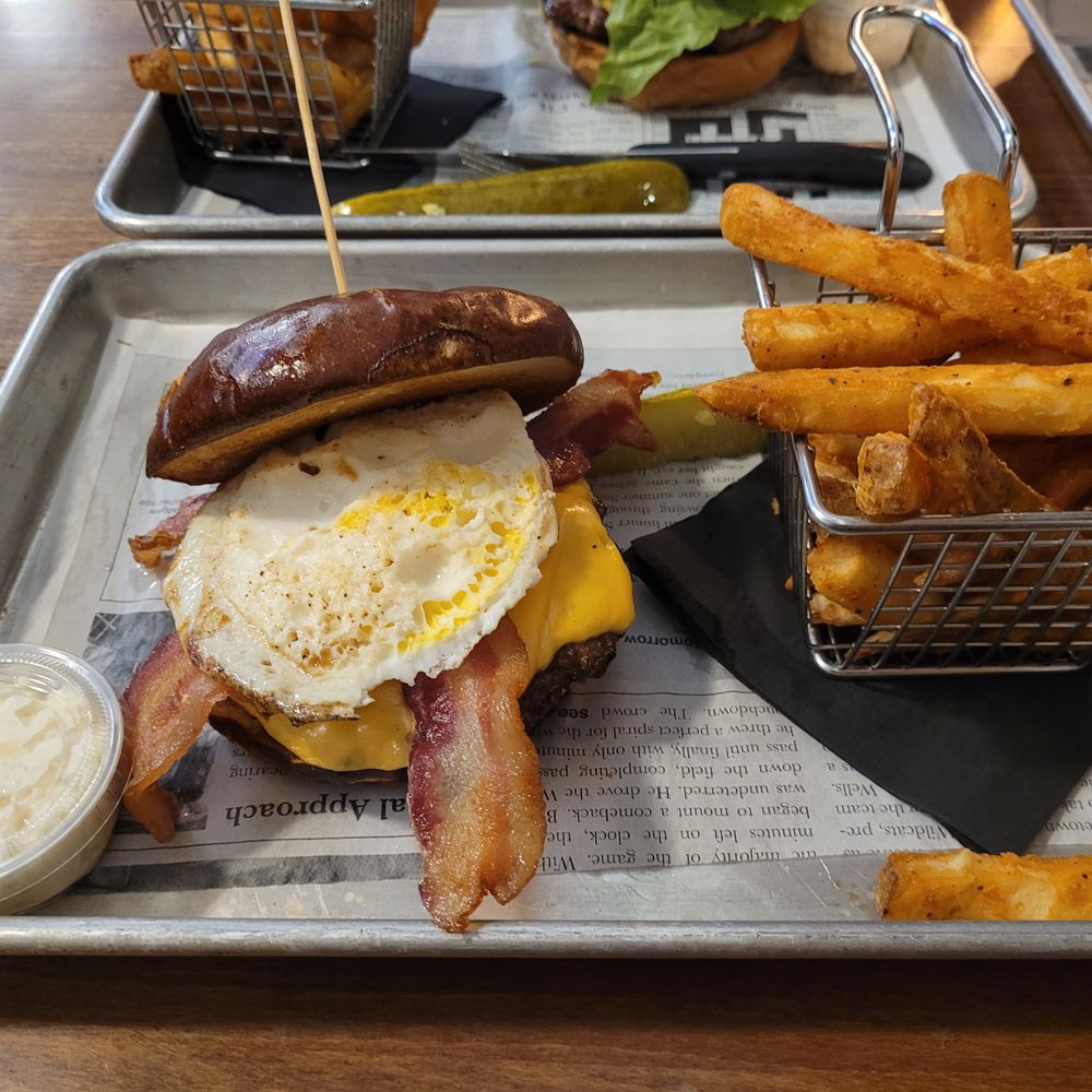 Cow Patty's - Fresh beef patty, fried egg, American cheese on a pretzel bun fries a pickle and coleslaw! ! - Burgers Near Me - Wantage, New Jersey