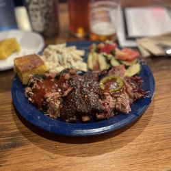 Dinosaur Bar-B-Que - Tres Ninos along with Tomato Cucumber salad and sadly I forgot what my second side was! But it was yummy none the less!