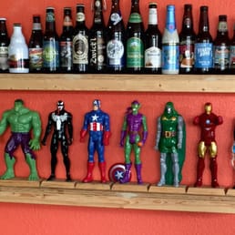 Bottled craft beer selection and action hero table markers.