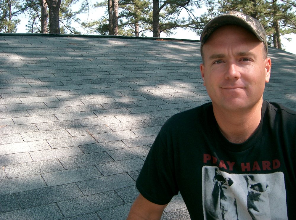 Slide of Mitchell's Roofing