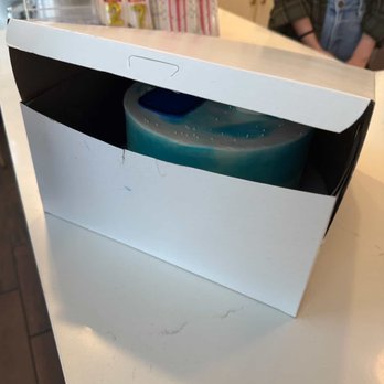Whipped Bakery & Cafe - box that did not fit the cake, gave it to us like this - Bakeries Near Me - Leander, Texas Whipped Bakery & Cafe - box that did not fit the cake, gave it to us like this - Bakeries Near Me - Leander, Texas