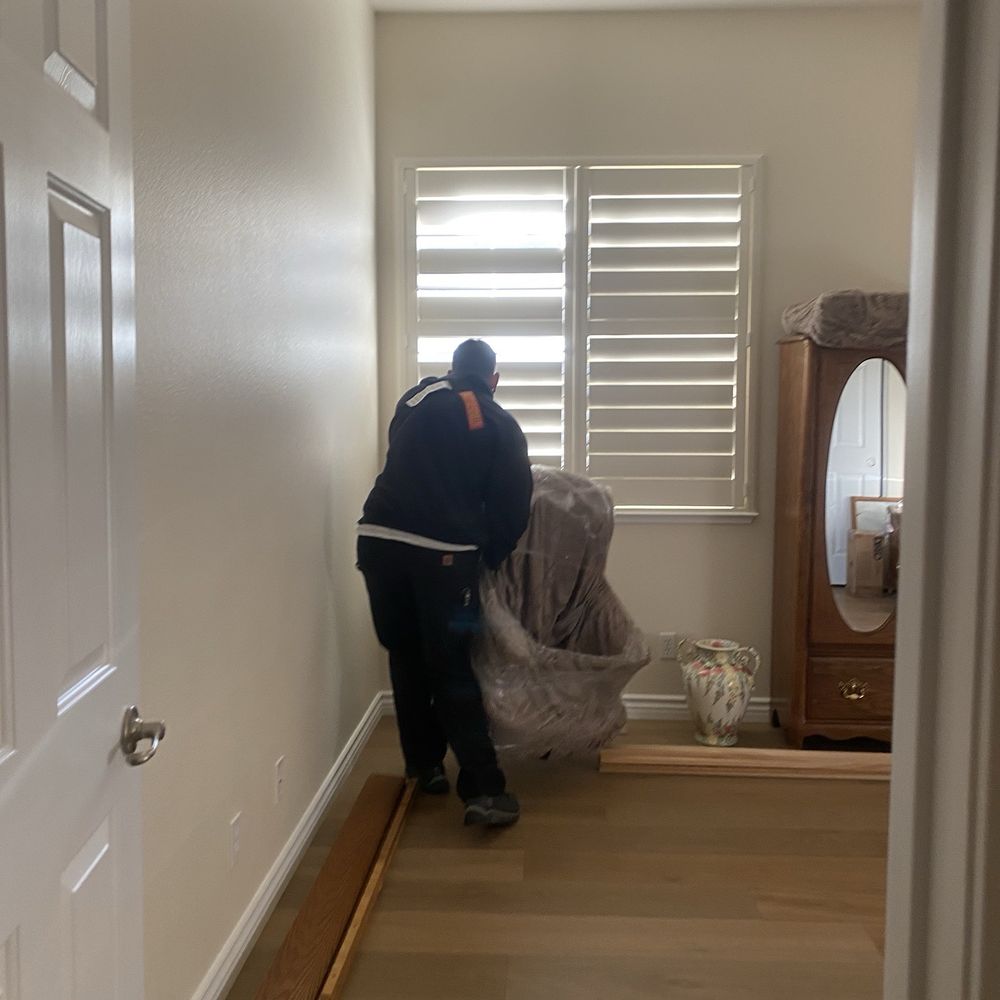 Full Service Moving - Beau Carefully Placing Furniture on our New Hardwood Floors ! - Movers Near Me - Carson City, Nevada Full Service Moving - Beau Carefully Placing Furniture on our New Hardwood Floors ! - Movers Near Me - Carson City, Nevada