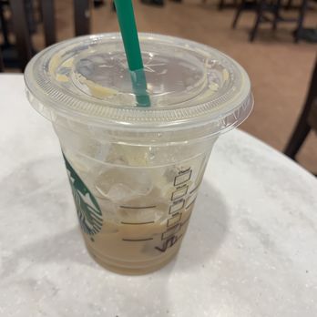Starbucks - Iced vanilla latte -- they charged me $4 for a cup of ice. I only took one sip from this :( - Coffee & Tea Near Me - Shelby Charter Twp, Michigan
