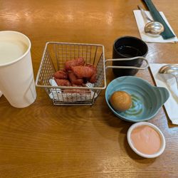 Yunnan Rice Noodle Soup - Soy Milk, Taiwanese sausage with dipping sauce, and a soy sauce egg.