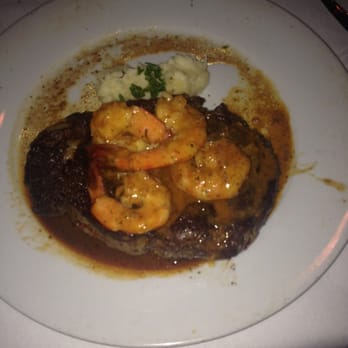 Ruffino's - Ribeye with BBQ shrimp and mashed potatoes. - Italian Near Me - Baton Rouge, Louisiana