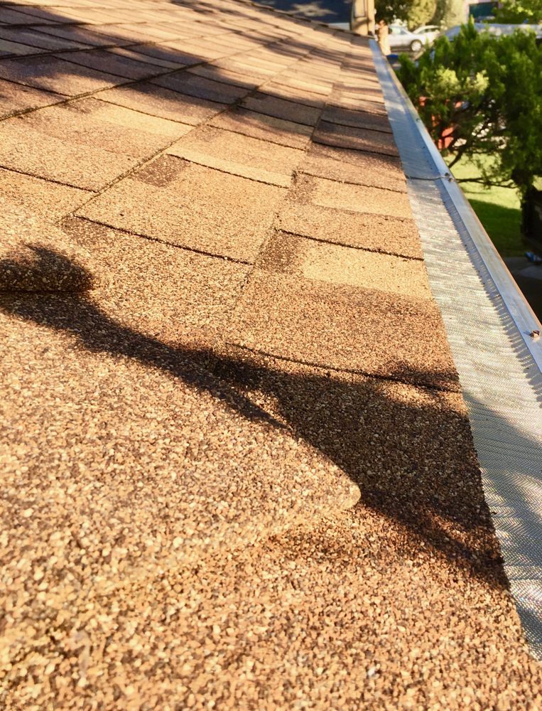 Slide of Economy Roofing