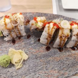 a close up of a plate of sushi a close up of a plate of sushi