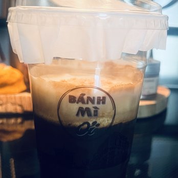 Banh Mi Oi - Coconut Creme Coffee is a unique fusion of bold Vietnamese coffee and a smooth, velvety layer of fresh coconut creme. Luscious. - Vietnamese Near Me - Falls Church, Virginia Banh Mi Oi - Coconut Creme Coffee is a unique fusion of bold Vietnamese coffee and a smooth, velvety layer of fresh coconut creme. Luscious. - Vietnamese Near Me - Falls Church, Virginia