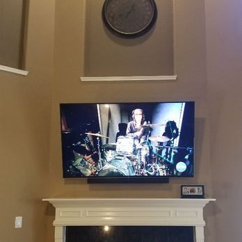 65 In Tv On A Brick Wall With Wire Concealment And Soundbar