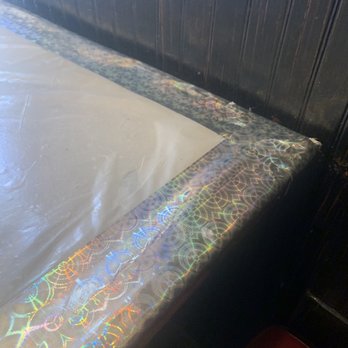 Hacienda Mexican Grill - Table "cover" is being held together with duct tape - Mexican Near Me - Salinas, California