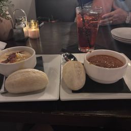 Bowl of SOD (loaded baked potato) and Bowl of Tomato Bowl of SOD (loaded baked potato) and Bowl of Tomato