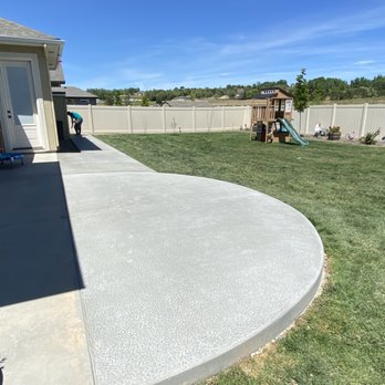Boden concrete - a backyard with a concrete patio - Masonry/Concrete Near Me