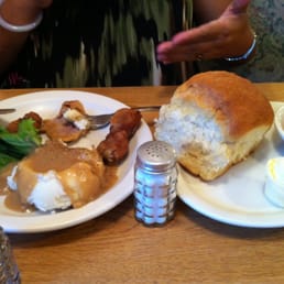 Pure comfort food! Pictured is a dinner roll as big as a loaf of bread. See salt shaker for perspective. Pure comfort food! Pictured is a dinner roll as big as a loaf of bread. See salt shaker for perspective.