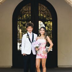 Lou Gentile's Flower Basket - The Flower Basket posse put together a beautiful corsage and boutonnière for my son & his girl for Homecoming.