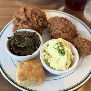 Fixins - Three piece chicken with potato salad and collard greens and biscuit with grape jelly butter - Soul Food Near Me - Detroit, Michigan Fixins - Three piece chicken with potato salad and collard greens and biscuit with grape jelly butter - Soul Food Near Me - Detroit, Michigan
