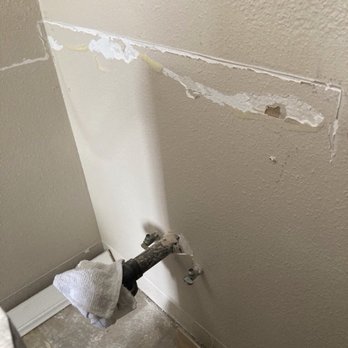 IAS Builders - Exposed plumbing. Wall being patched. - Damage Restoration Near Me - El Cajon, California IAS Builders - Exposed plumbing. Wall being patched. - Damage Restoration Near Me - El Cajon, California