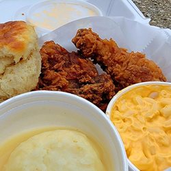 Rick’s Crispy Chicken - Two pieces of dark meat chkck with mashed potatoes and mac and cheese.