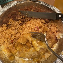 Cheese Enchilada without the accompaniments it was supposed to have.