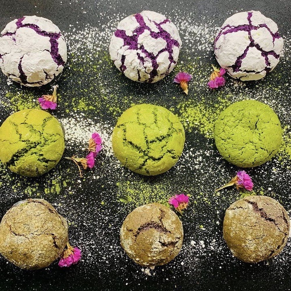 Peony Bakery - Top to bottom: ube crinkle cookies, matcha cookies, and hojicha cookies - Desserts Near Me Peony Bakery - Top to bottom: ube crinkle cookies, matcha cookies, and hojicha cookies - Desserts Near Me