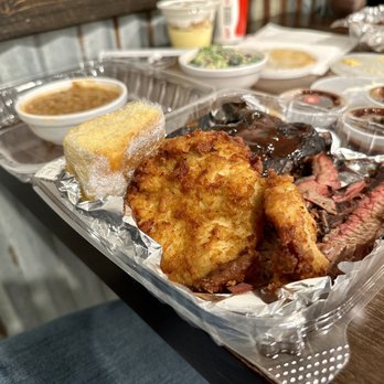Smoked Kitchen - a tray of food on a table - Barbeque Near Me - Charlottesville, Virginia