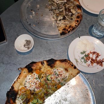 Gjelina - Squash blossom and wild mushroom pizzas - New American Near Me - Venice, California Gjelina - Squash blossom and wild mushroom pizzas - New American Near Me - Venice, California